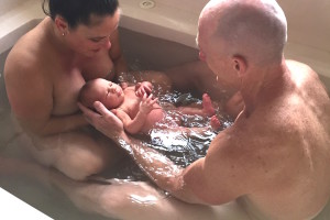 Mana first bath with mom and dad